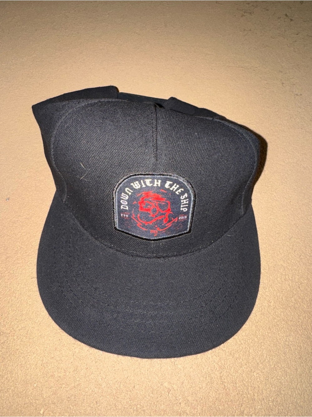 Black Patch Baseball Cap with Red Skull Graphic